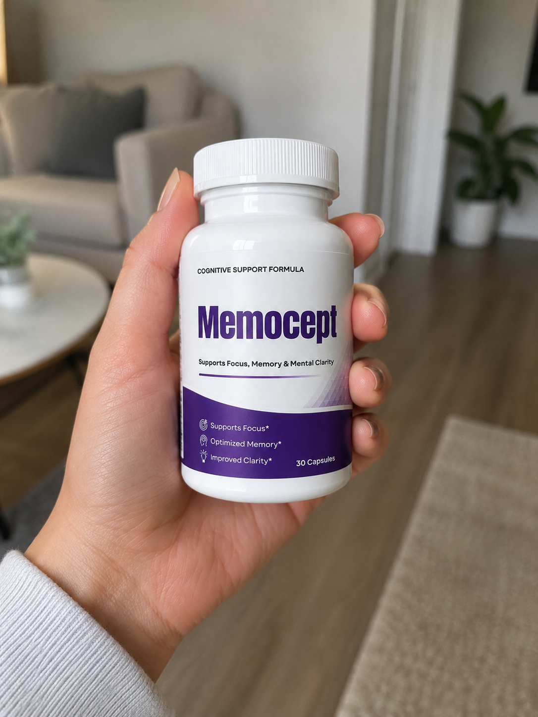 Holding a bottle of Memocept